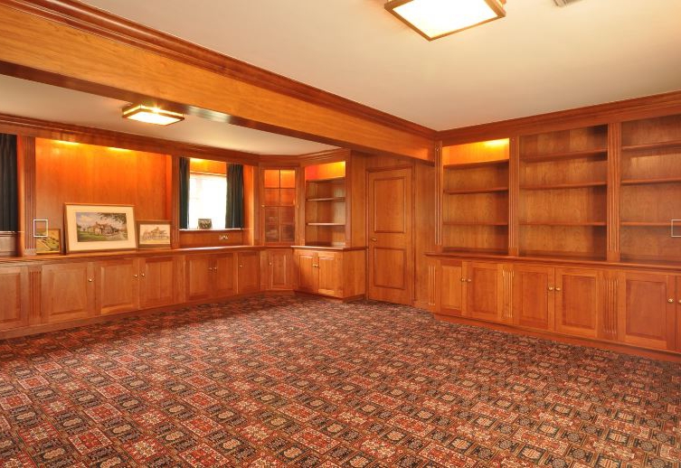 The property has its own drawing room with library shelves