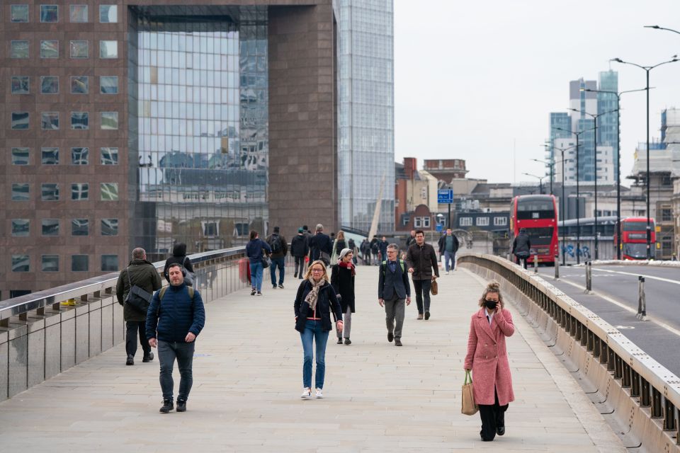 Londoners pictured on their morning commute as the nation marked a National Day of Reflection earlier in the week