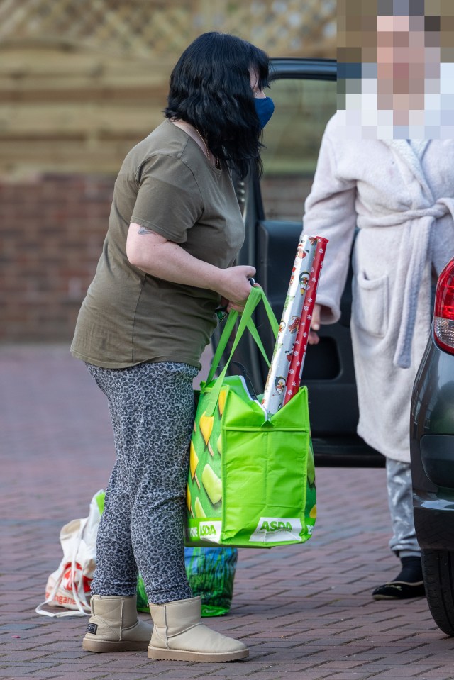 Philpott left her bail hostel on Monday in Ugg-style boots, leopard print trousers and an ill-fitting khaki t-shirt