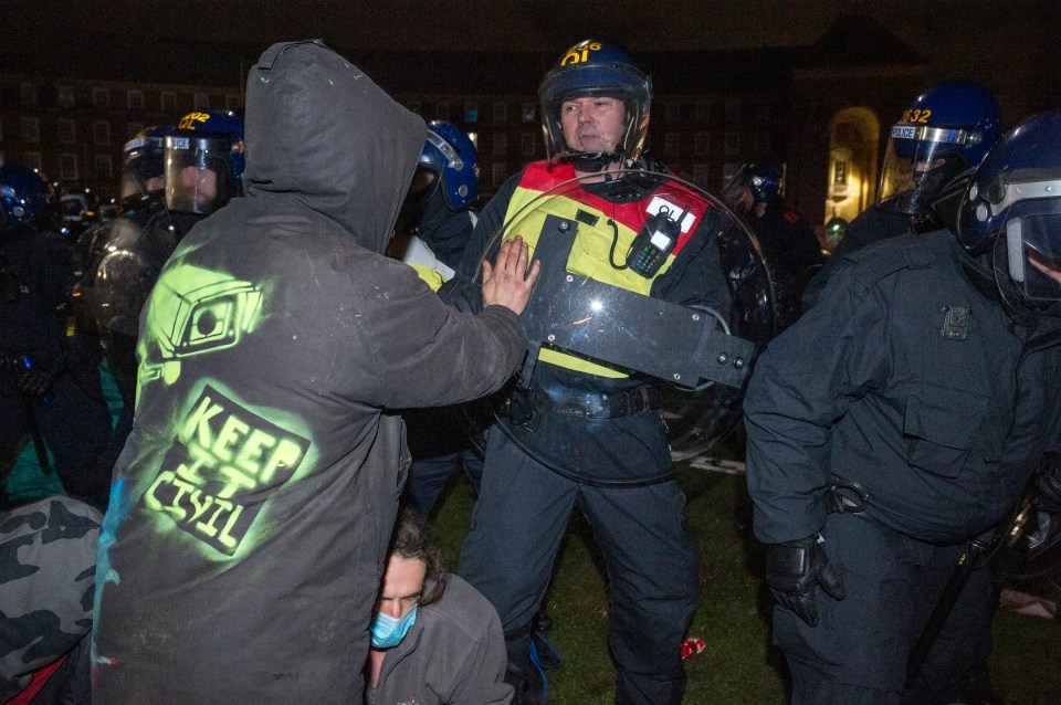 Riot police were called to deal with crowds at College Green