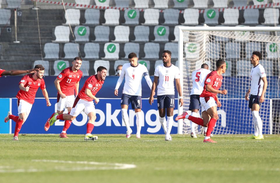 Switzerland's Dan Ndoye, second right, is off and running after his winner as the Young Lions flop once more when it matters