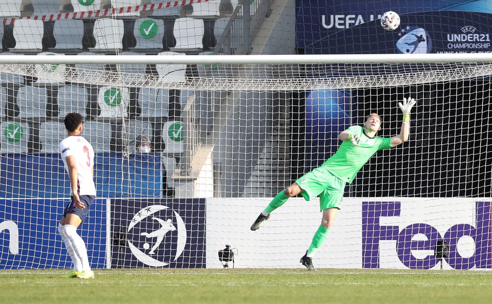 England keeper Aaron Ramsdale can't keep out Dan Ndoye's accidental shot creeping in