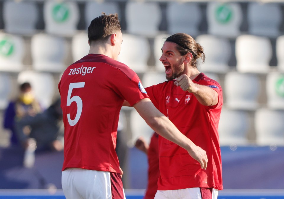 Jan Bamert and Cedric Zesiger illustrate just how much victory meant to Switzerland