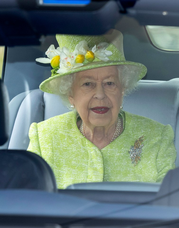 The Queen went maskless and was cheered at the air force celebration in Runnymede, Surrey