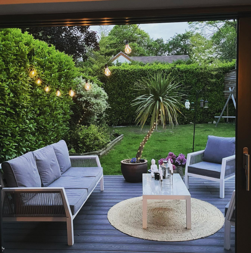  The home has a magical garden with decking and cute lights