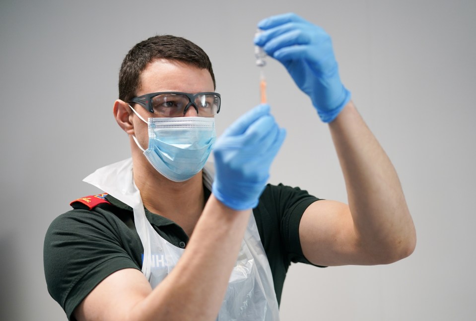 Five countries have halted the use of the Oxford/AstraZeneca Covid vaccines over fears of fatal blood clots. Pictured: Chris Ward, a paramedic, draws up a dose at the Darlington Arena Vaccination Centre, March 1