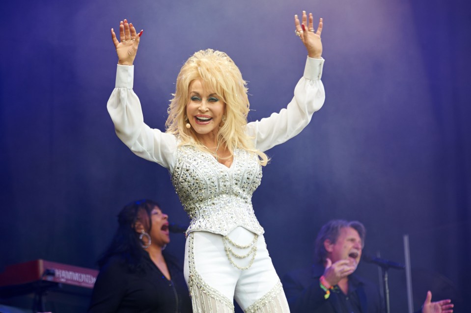 Dolly Parton is always seen with a glamorous pair of gloves on or long sleeves