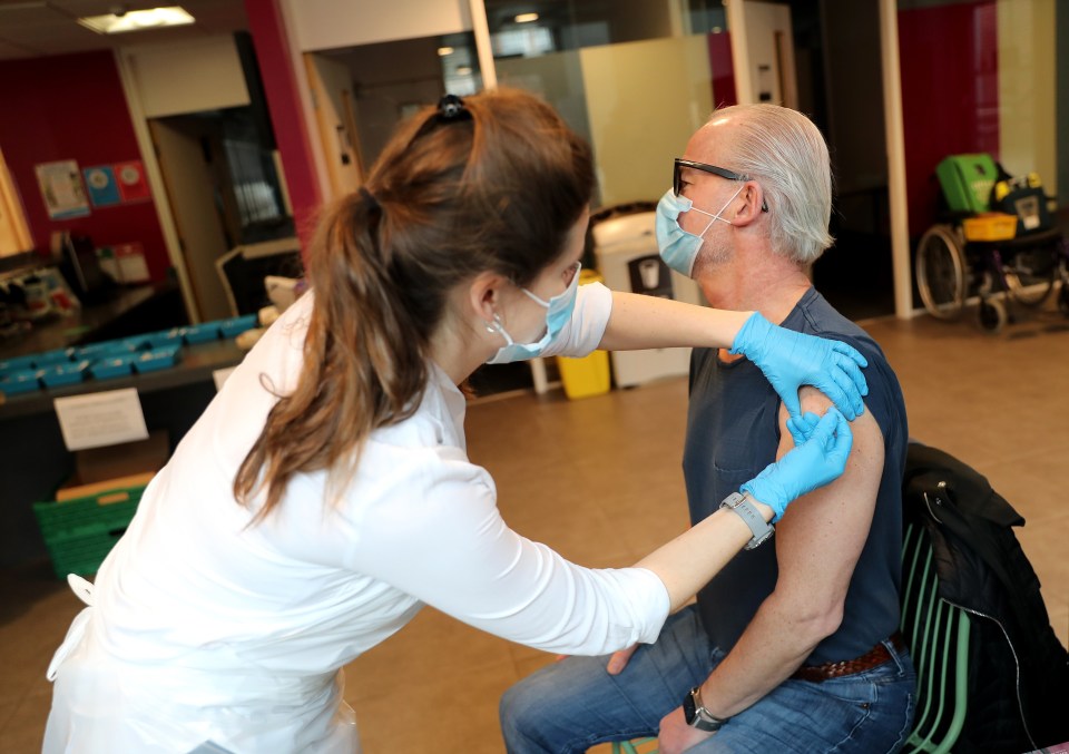 UK regulators have encouraged Brits to keep getting their vaccine. Pictured: Clinical Pharmacist Ellie Morton administers the Oxford AstraZeneca jab at Kingston University’s Penrhyn Road campus on March 12