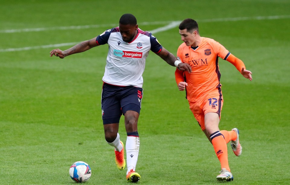 Bolton defender Ricardo Santos (left) is SunSport's League Two player of the year and in the team of the season