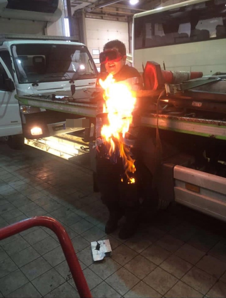 The moment bullied mechanic Joe Higginson was set alight at his Mercedes workplace