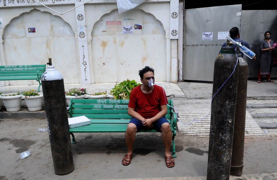 A Covid-19 patient gets oxygen on the spot in Indirapuram, Ghaziabad, Uttar Pradesh, India