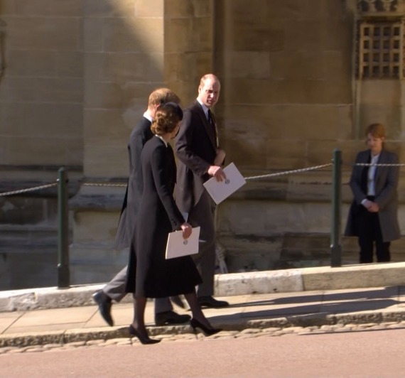 Harry and William were separated by their cousin as they walked to the chapel - but were later joined by Kate as they chatted together