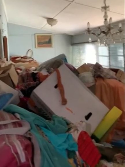 The house was filled with mountains of rubbish in every room