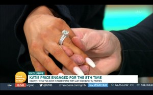  Katie and Carl show off her ring on GMB