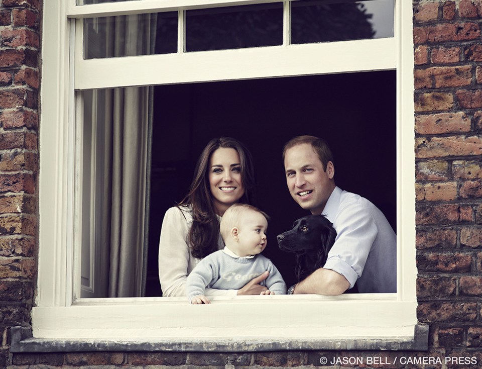 Look out . . . at Kensington Palace with George and the family’s Cocker Spaniel Lupo in 2014