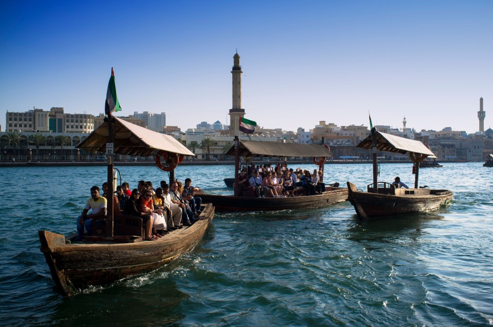 Families can see old and new Dubai from an Abra boat, which travels across the creek