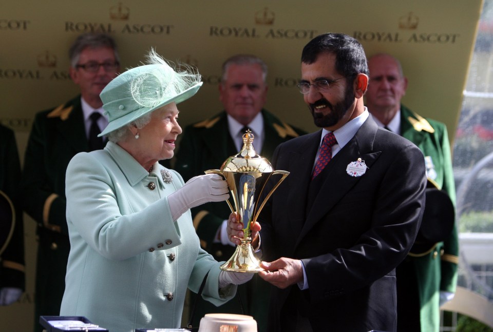 Queen Elizabeth II presenting Sheikh Mohammed with the Gold Cup at Royal Ascot in 2012