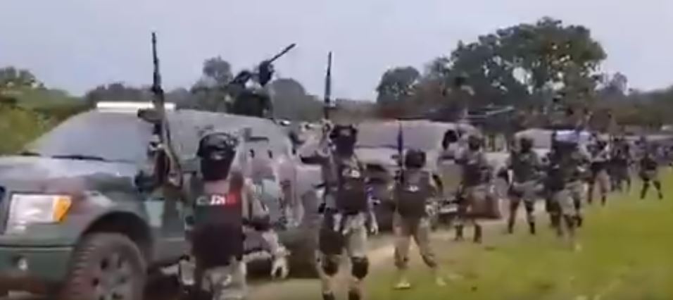 The Jalisco New Generation Cartel wearing bulletproof vests wield assault rifles in video shot in July