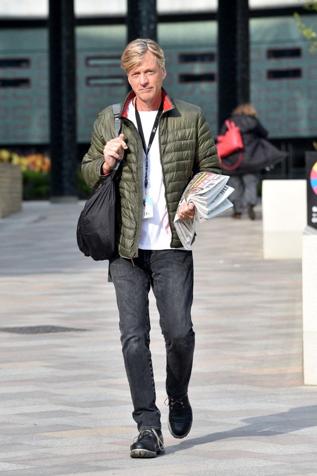 Richard arriving at the ITV studios with a pile of newspapers in 2019