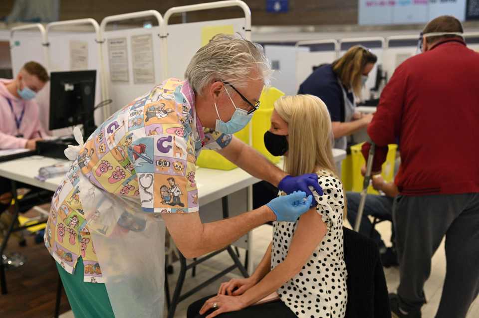 People getting their vaccines in Derby Arena at Pride Park, March 31