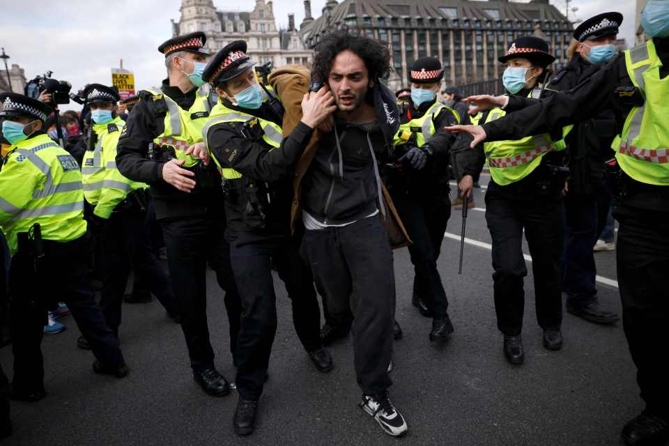 NPolice detain a protester during a 'Kill the Bill' protest in London