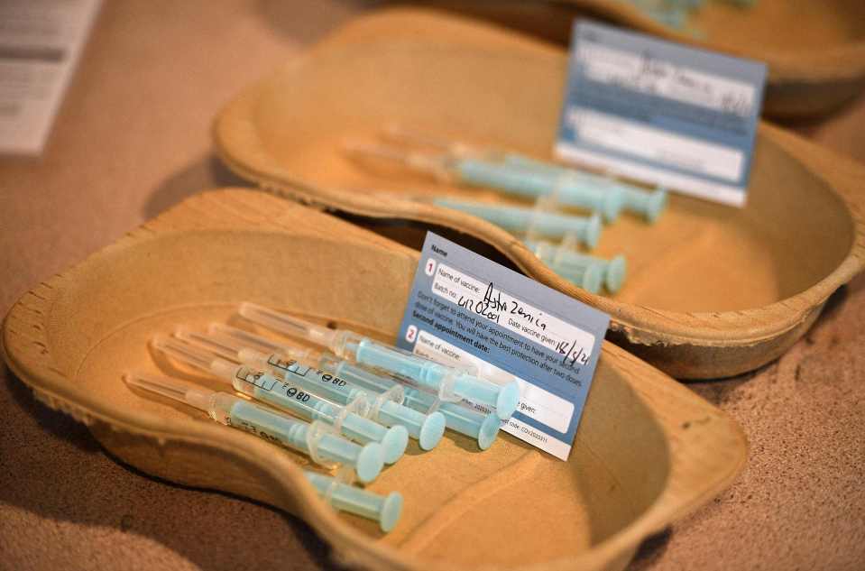 Syringes filled with doses of the AstraZeneca/Oxford Covid-19 vaccine wait to be distributed to patients at Lichfield cathedral, April 6