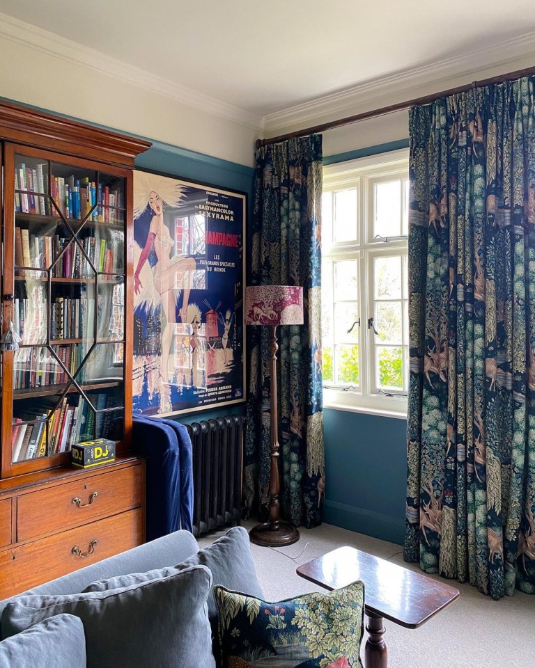 The cosy living room features some vintage furniture