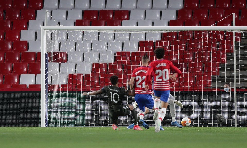 Marcus Rashford slid in to slot home Man Utd's opener at Granada