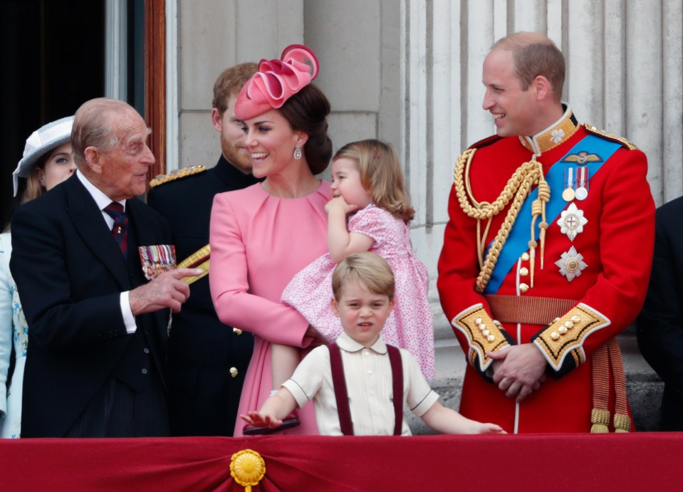 The Duke of Edinburgh chatting with the Duke and Duchess of Cambridge