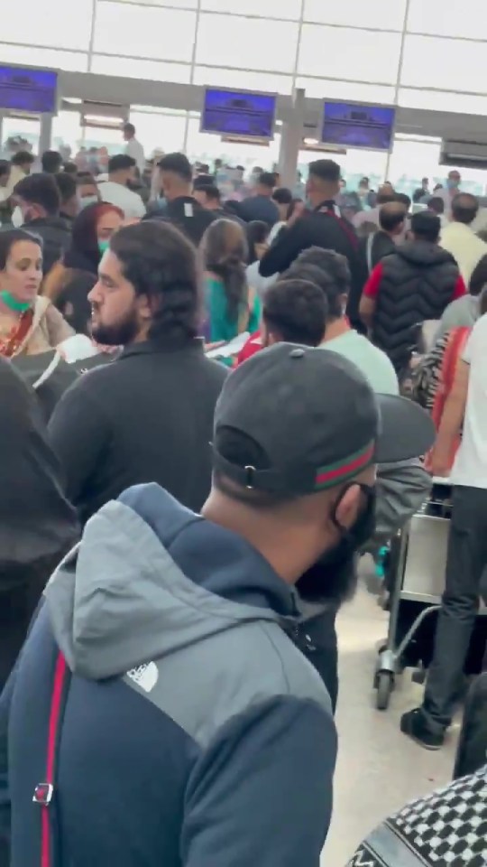 Video footage recorded in Islamabad shows people crowding into the airport to try to get home