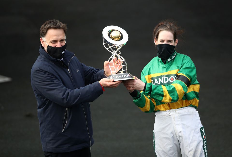 Henry De Bromhead poses with the famous trophy alongside Rachael Blackmore