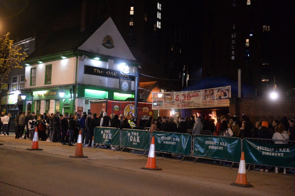 People queueing outside The Oak Inn in Coventry, hoping to enjoy their first post-lockdown pints mere moments after midnight