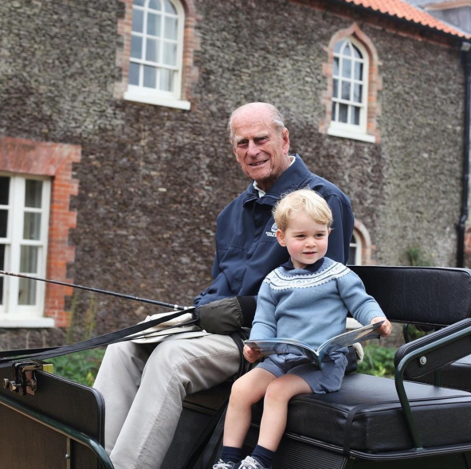 The couple also released a photograph of Philip with Prince George, taken by Kate Middleton