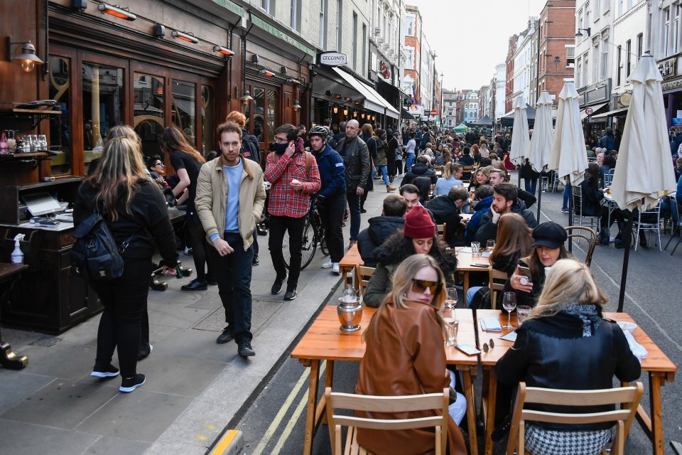 Revellers celebrate being allowed to go to cafes and restaurants again