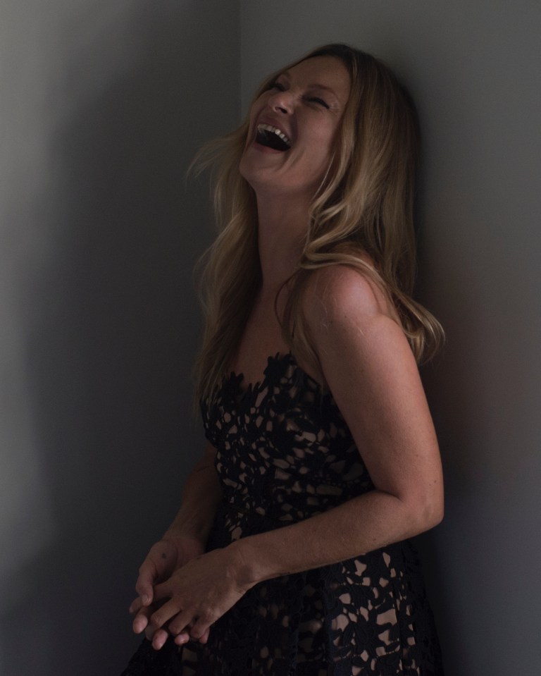 Kate Moss lets her guard down as she has a right old laugh at a photoshoot