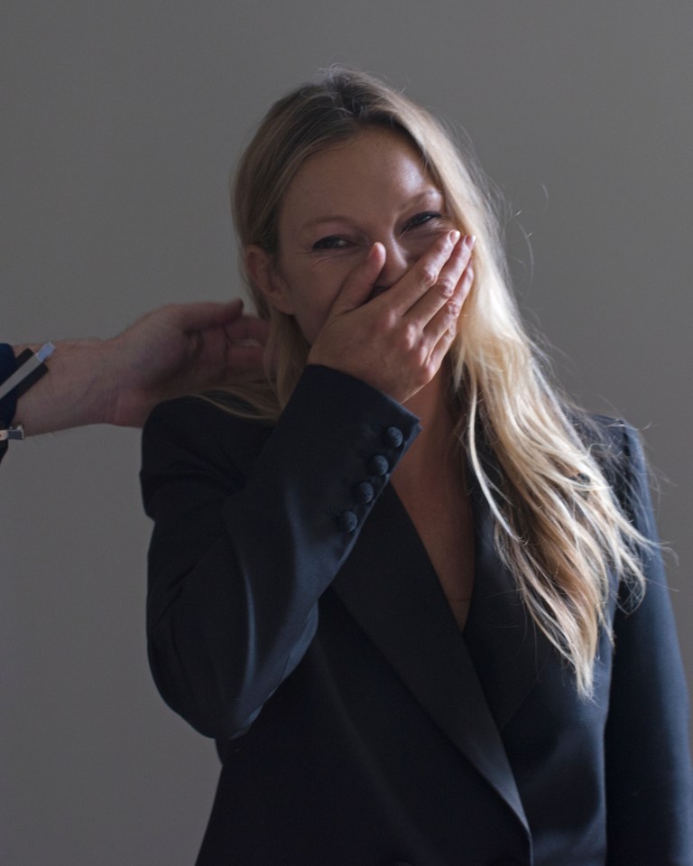 Supermodel Kate has a chuckle during the fashion shoot