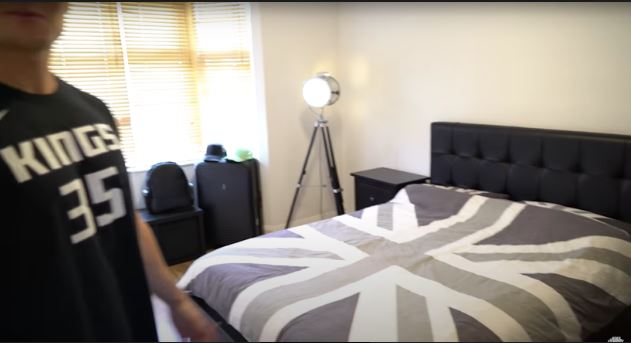 His black and white Union Jack bedding goes well with the rest of the room