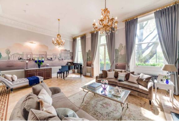 The property boasts chandeliers, sprawling dining rooms and 10 bedrooms