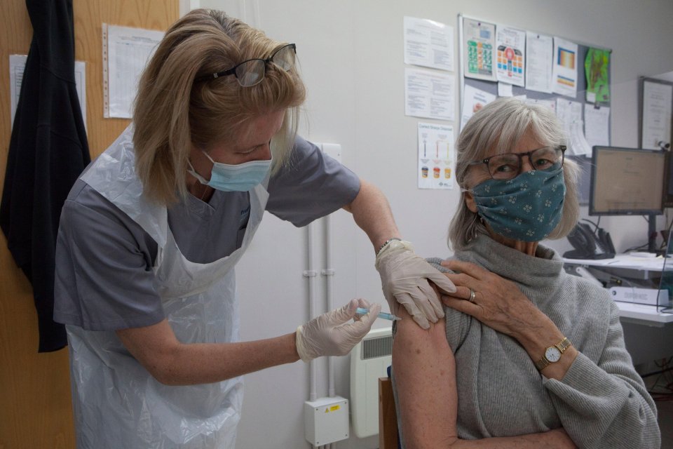 The Indian variant has two mutations which could help it avoid antibodies from prior infection or vaccines. Pictured: A woman receiving her jab in Henley-on-Thames