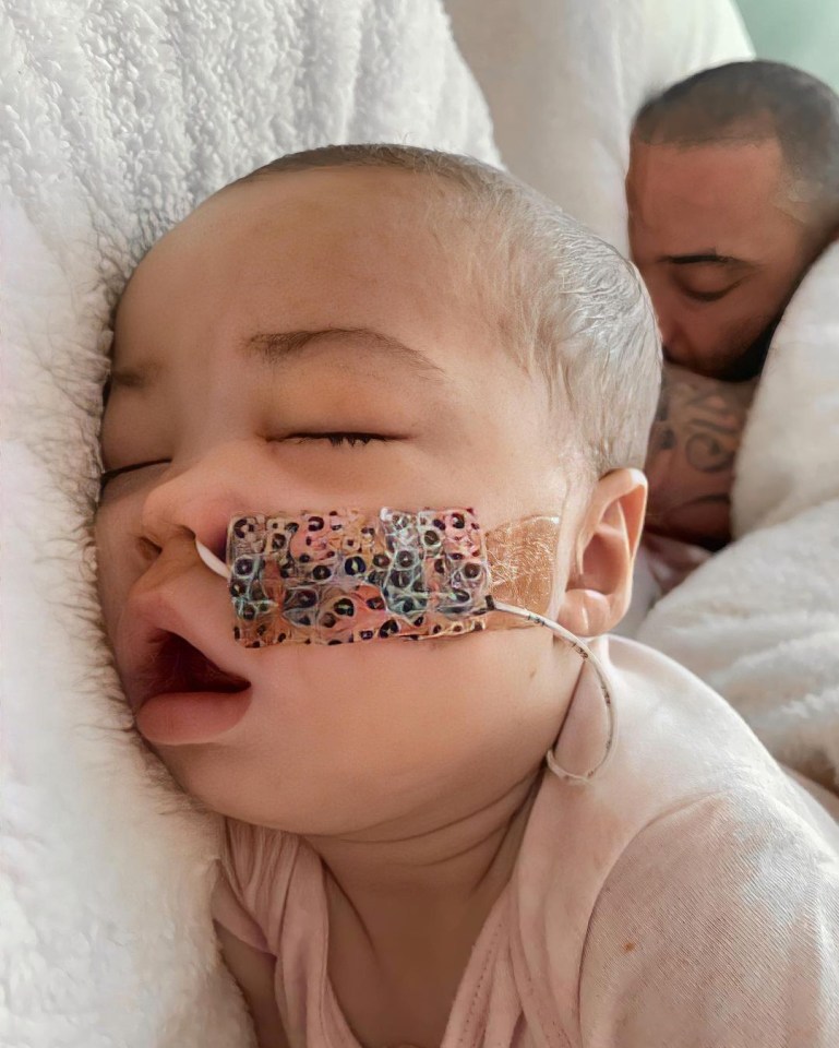 The little girl sleeps next to dad, Ashley