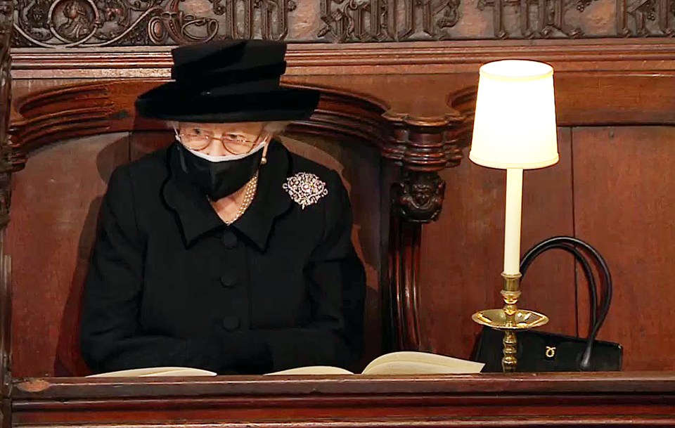 The Queen pictured alone at her husband's funeral - an image which touched the nation's hearts