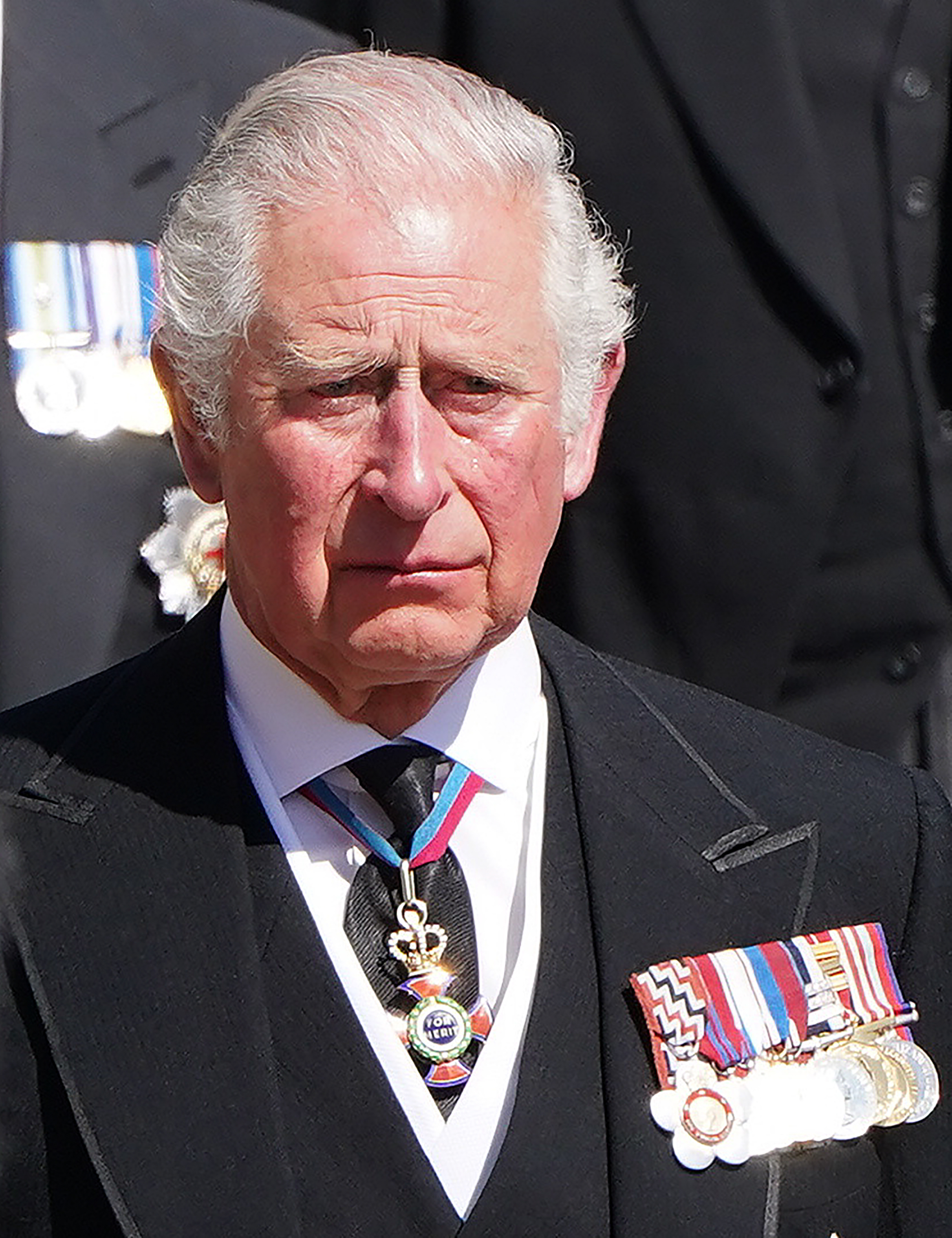 Prince Charles fought back tears as he followed his father's coffin in today's ceremony