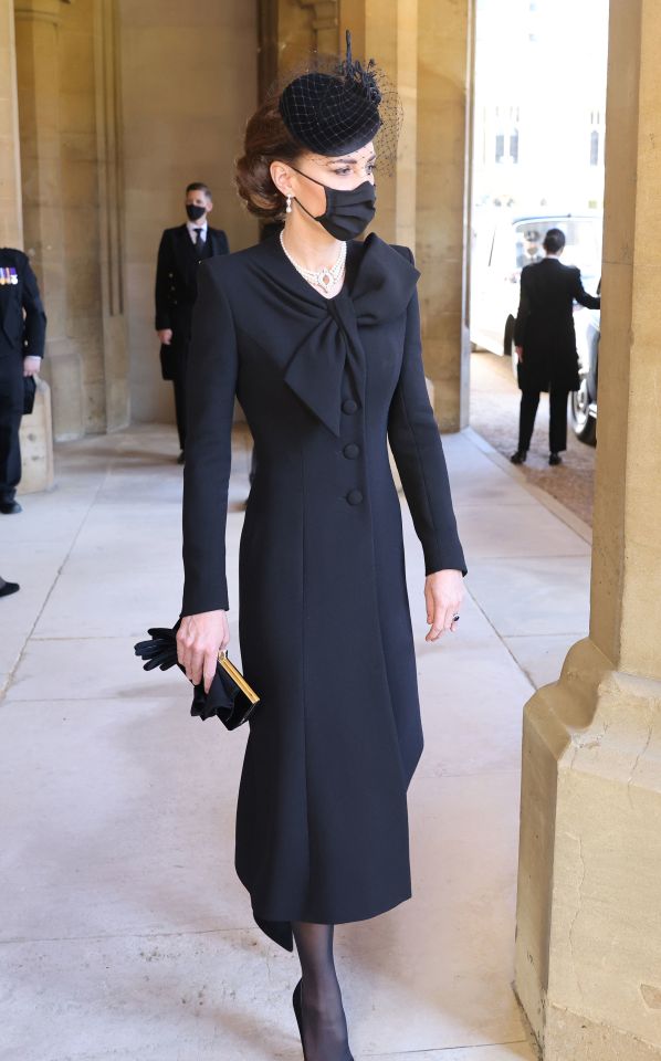 Kate's coat has a bow detail on the collar