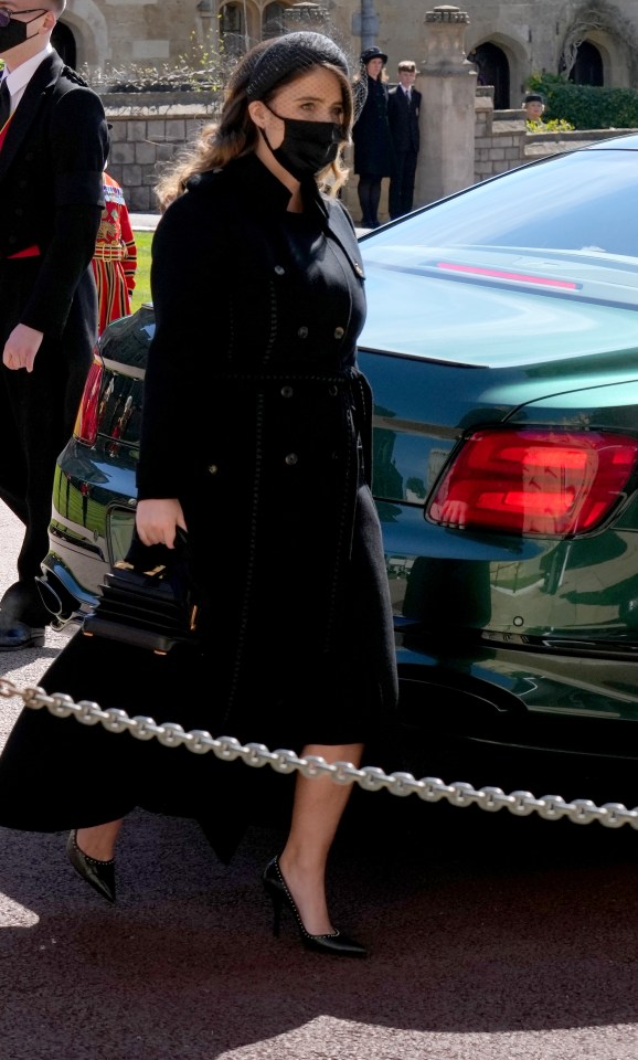 Princess Beatrice at the funeral yesterday stepping out of a car