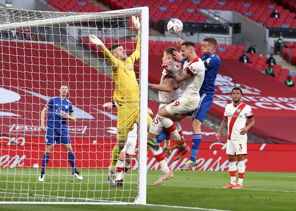 Jamie Vardy rises to threaten during a rare moment of first-half danger