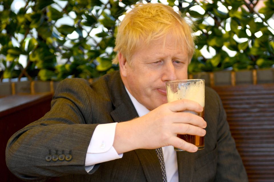 Boris appeared to enjoy his first public alcoholic beverage since pubs were able to reopen last week