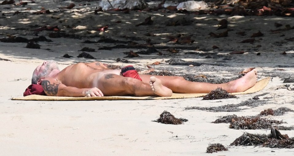 Gazza stripped completely naked to sunbathe