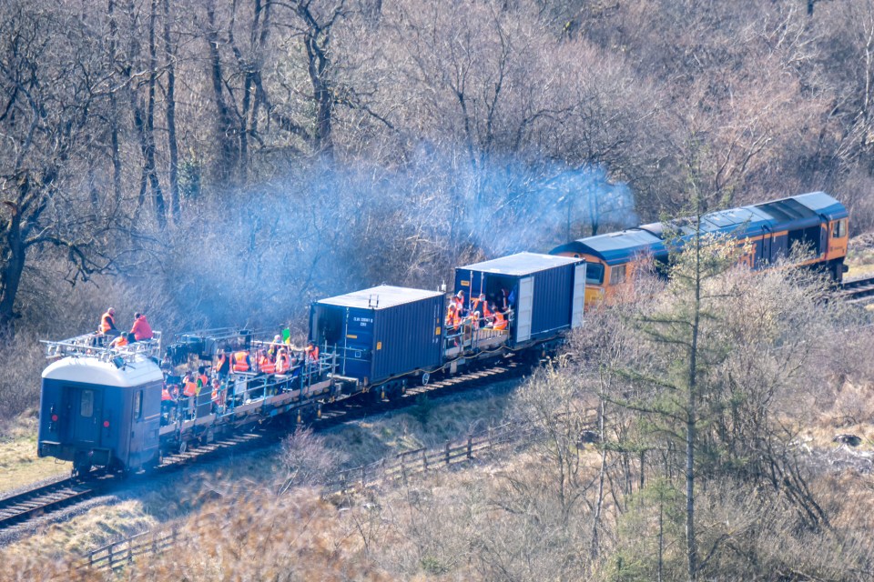 A train has been specially converted into a moving film set to shoot the action