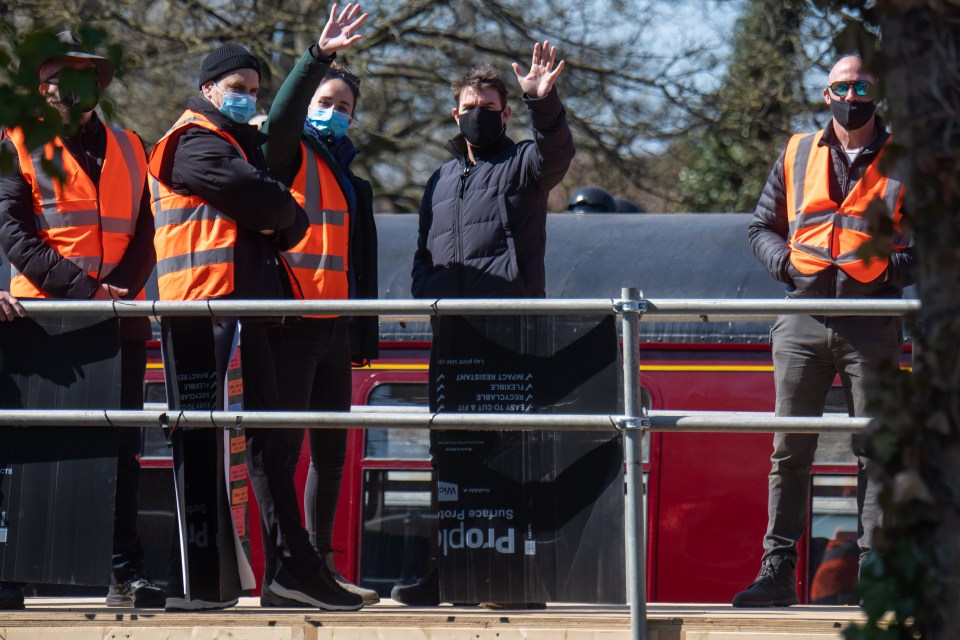 Tom offered a wave to fans from the set of the movie, which comes out next year