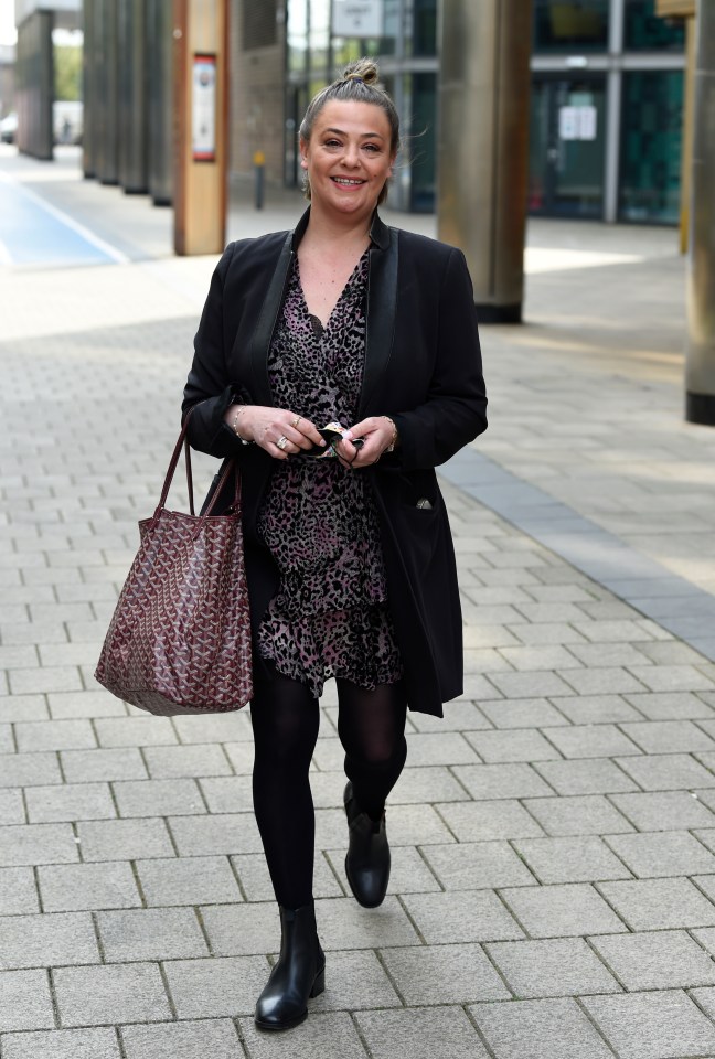 Lisa Armstrong was all smiles as she left work today wearing a mini-dress